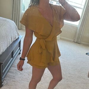 The impeccable pig open back romper size M